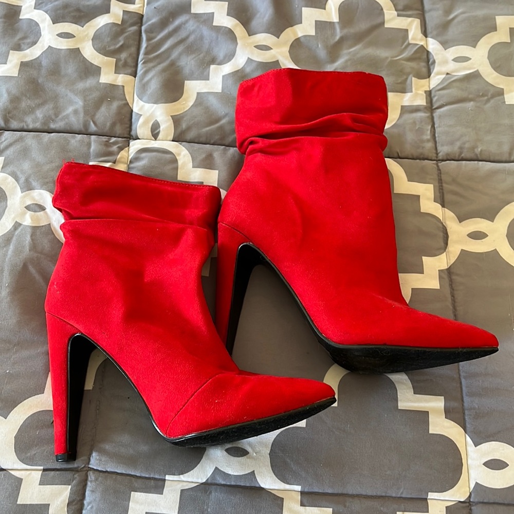 Never worn outside cherry red booties. Size 7